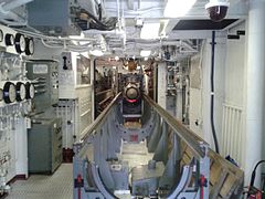 RIM-8 Talos missile loading conveyor aboard USS Little Rock.