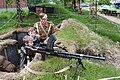 Display of weapons by a Second World War reenactor during an open day