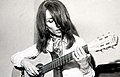 Image 6Fairuz playing guitar (from Culture of Lebanon)