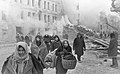 Image 16Residents of Leningrad leave their homes destroyed by German bombing. About 1 million civilians died during the 871-day Siege of Leningrad, mostly from starvation. (from Soviet Union)