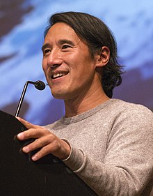 Jimmy Chin speaking at the University of Michigan