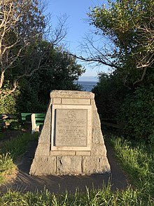 Cairn by Dallas Road Waterfront Trail (Victoria, BC, Canada) commemorating Marilyn Bell's historic swim across the Juan de Fuca Strait. MarilynBellCairnDallsRdVictoriaBC.jpg