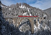 107 votes in Final; A RhB Ge 4/4 II with a push–pull train crosses the Wiesen Viaduct between Wiesen and Filisur, Switzerland. +/− Credit:Kabelleger / David Gubler (http://www.bahnbilder.ch) (License: GFDL / CC BY-SA 3.0)