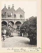 A garden terrace with steps on the house's east side