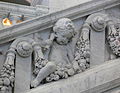 Putto using 1890s telephone. Carving in staircase of Library of Congress Jefferson Building