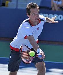 Sergiy Stakhovsky caused an upset in the second round by defeating seven-time champion Roger Federer Sergiy Stakhovsky.jpg