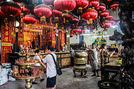 Devotees at the Goddess of Mercy Temple, a Taoist temple in George Town, Penang, Malaysia.