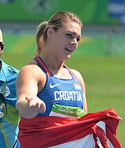 Sandra Perkovic successfully defend her Olympic discus throw title SandraPerkovicTourHonneurRio2016.jpg