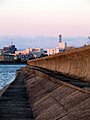 Photo of seawall, with building in background (from Tsunami)