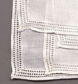 Hemstitch decorative drawn-thread stitch used to embellish hems and seams