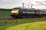 An InterCity 225 at speed on the East Coast Main Line in Nottinghamshire, view on a Class 91 locomotive