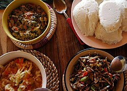 Three types of relishes are used here to accompany nshima (in the top right), a cornmeal product in African cuisine. Nsima Relishes.JPG