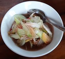 Rujak kuah pindang, uses thin sweet and spicy sauce made of pindang fish brine broth, Bali. Rujak kuah pindang.jpg