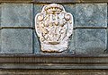 English: Coat of arms of Bianca Ludmilla countess of Thurn at the rustication portal Deutsch: Wappenrelief der Bianca Ludmilla Gräfin von Thurn über dem Rustikaportal