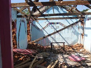 Orissa violence destroyedbuilding.jpg