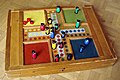 Image 15Parcheesi is an American adaptation of a Pachisi, originating in India. (from Game)