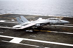 VF-24 F-14A lands on the USS Nimitz in 1992. Note that the refuel probe cover is gone F-14 Tomcat VF-24.jpg