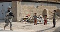 US soldier patrolling the streets of Diwaniyah