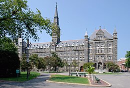 Facade of Healy Hall, with Bishop John Carroll statue in front