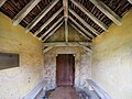 15th century porch & south door with rare 'stepped' cross
