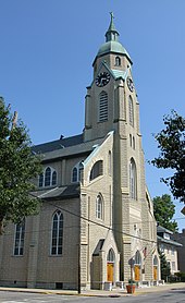 Sacred Heart Church, built in 1892, has long been one of Bellevue's tallest structures. The church is pictured in the city's official logo. Sacred-Heart-Church-Bellevue-KY.jpg