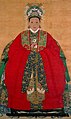 Ming dynasty noblewomen wearing a green embroidered xiapei over her red robe.