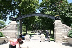 The southwestern entrance into Portage Park at the intersection of Irving Park Road and Central Avenue