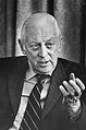 Alistair Cooke, head-and-shoulders portrait, facing front, gesturing with left hand, during interview, March 18, 1974.jpg