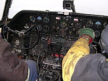 "Working office" of a C-46, c. 2006, over northern Manitoba C-46 cockpit.jpg