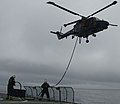 S-256: Danish navy helicopter (Westland Lynx) doing Helicopter In-Flight Refueling (HIFR) from a Thetis-class vessel