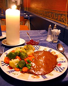 Finnbiff (Reindeer steak) served with potatoes, brown sauce, vegetables and lingonberry jam Norwegian.cuisine-Reinsdyrsteik-01.jpg