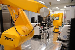 Chemogenomics Staubli robot retrieves assay plates from incubators Chemical Genomics Robot.jpg