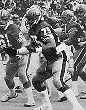 Covert, who wore #75 at Pitt, during the 1980 college season JimboCovert Pitt 1980.jpg