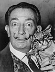 Surrealist Salvador Dalí with the flamboyant moustache he popularized.