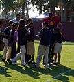 Taylor Mays signing autographs for school children after a USC practice