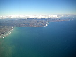 Aerial view of the eastern False Bay coast, looking somewhat south of east: Gordon's Bay (left) to Cape Hangklip (right) FalseBayCoast-aerial.jpg