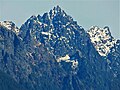 Merchant Peak centered, with the southeast subsidiary subpeak (5,831 ft) to the right. The subpeak is mistakenly labelled as Merchant Peak on old USGS maps.