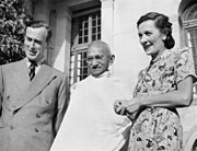 Mahatma Gandhi with the Mountbattens, c.1947. Gandhi's signature dress of a white shawl and dhoti, which he wove himself, was a symbol of self-reliance.