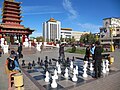 Playing chess near the Seven Days Pagoda, Elista