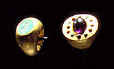 Rings from Tillia tepe; the left one represents a seated Athena. Tomb II.