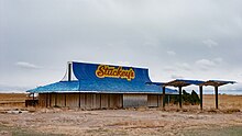 An abandoned Stuckey's restaurant and gas station along the freeway in 2004 Abandoned Stuckey's restaurant.jpg