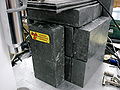 Lead bricks stopping radioactive rays from coming out