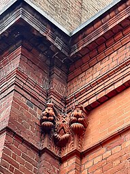 Decorative brickwork, carvings by Joseph Cribb