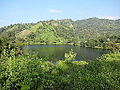 Image 51Bagakain Lake, also called Boga Lake is located in Ruma Upazila in Bandarban. It is a natural sweet and deep water lake situated nearly 1,246 feet (380 m) above sea level. The irregularly shaped lake is bounded on three sides by mountain peaks covered with thick bamboo bushes. Photo Credit: Masum Ibn Musa