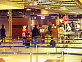 Juxtaposed immigration controls at Brussel-Zuid/Bruxelles-Midi railway station, with the Belgian Federal Police carrying out exit immigration checks from the Schengen Area in front, and the UK Border Force carrying UK entry immigration checks behind.