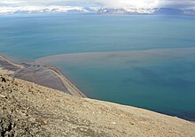 Suspended sediment from a stream emptying into a fjord (Isfjorden, Svalbard, Norway) IsfjordenSediment.JPG