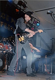 Rod Clements on stage with Lindisfarne in 1991 RodClements1991.jpg