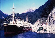 Wanganella moored in a cove of Doubtful Sound. The cove is now known as Wanganella Cove. TSMV Wanganella.JPG