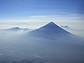 Volcán de Agua exhibits the steep cone shape typical of stratovolcanoes; as seen from Acatenango's Pico Mayor.