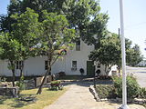 Trees shade the entrance to the Landmark Inn, a historic site in Castroville.